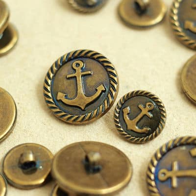 Button with metal aspect - bronze with anchor