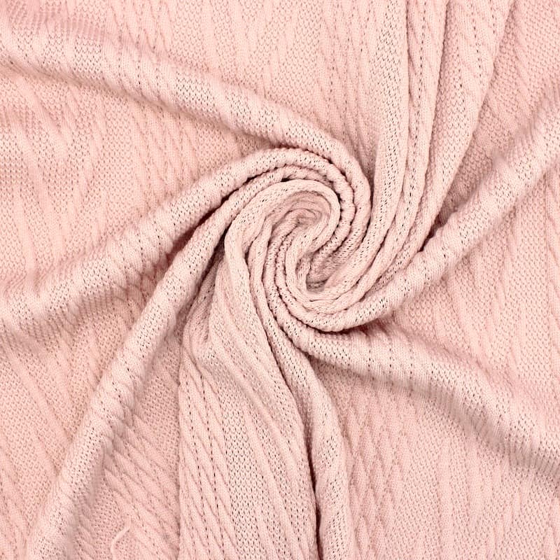 Knit fabric with twisted pattern pink