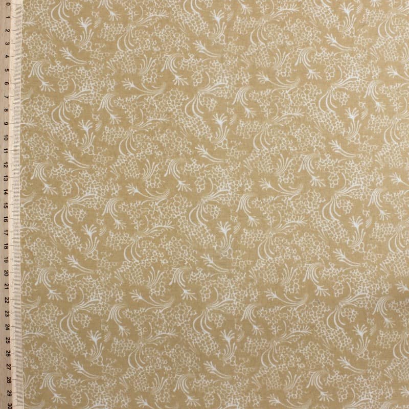 Beige polyester fabric with white flowers