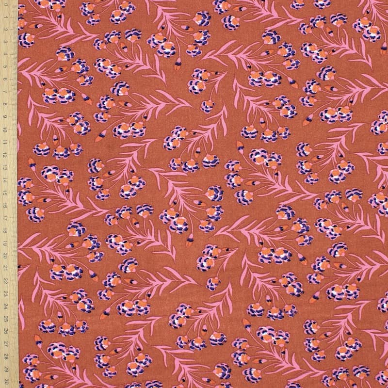 Viscose fabric with flowers - rust-colored