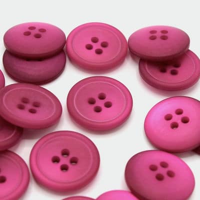 Bouton fantaisiefuchsia