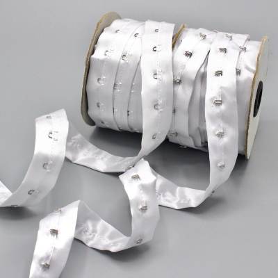 Satin strip with metal fasteners - white