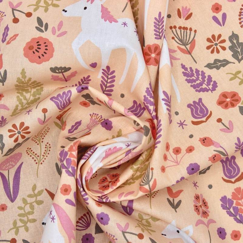 100% cotton unicorn and flower fabric - salmon