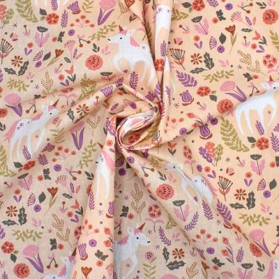 100% cotton unicorn and flower fabric - salmon