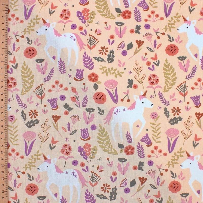 Tissu 100% coton licorne et fleur - saumon 