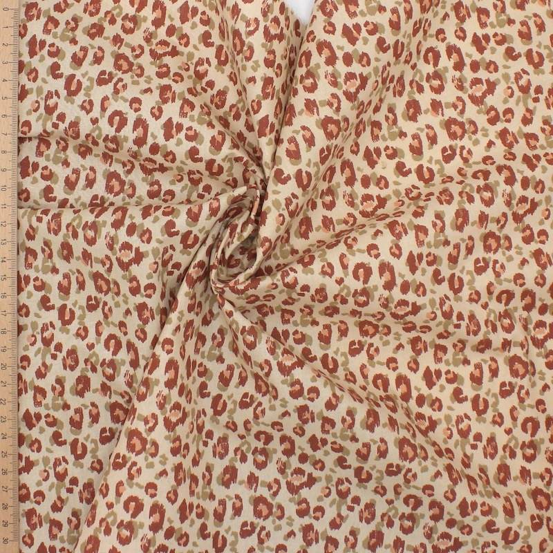 100% cotton animal print fabric - beige/brick